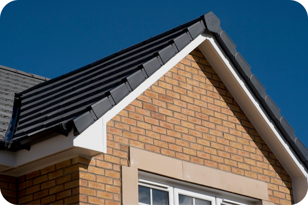Gable end with dry verge caps
